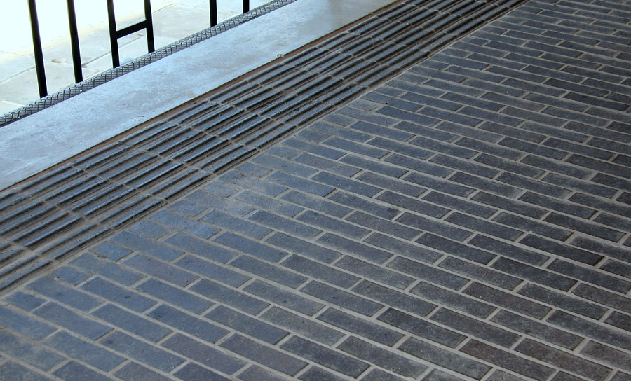 ACE Hotel Shoreditch ribbed pavers and blue bricks