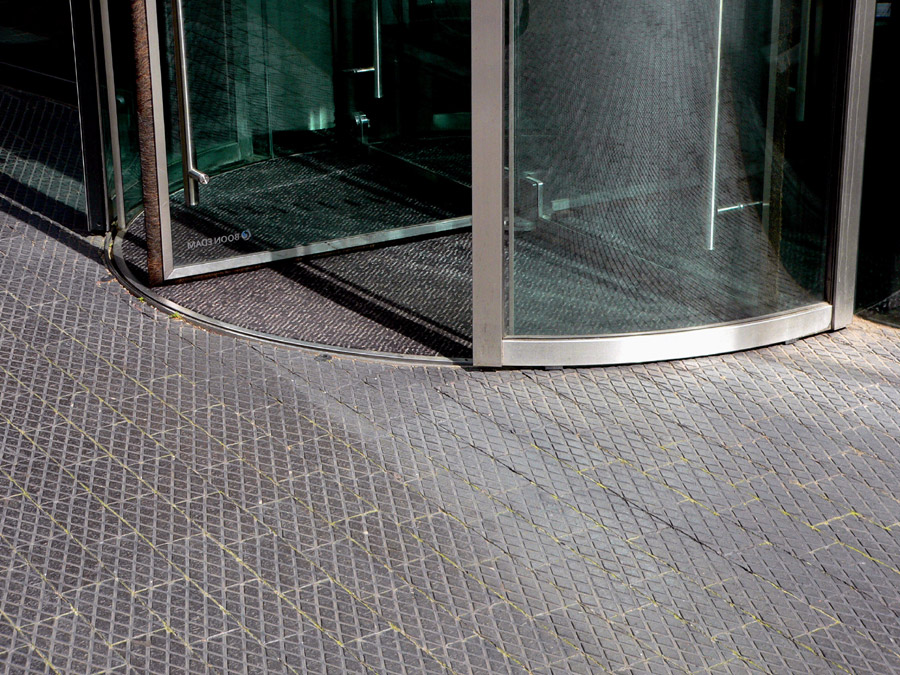 Diamond Chequer pavers at entrance revolve in Camden