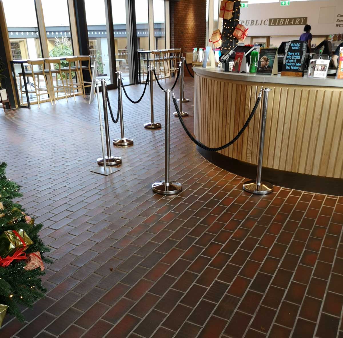 Dark multi quarry tiles at West Norwood cinema and library in London