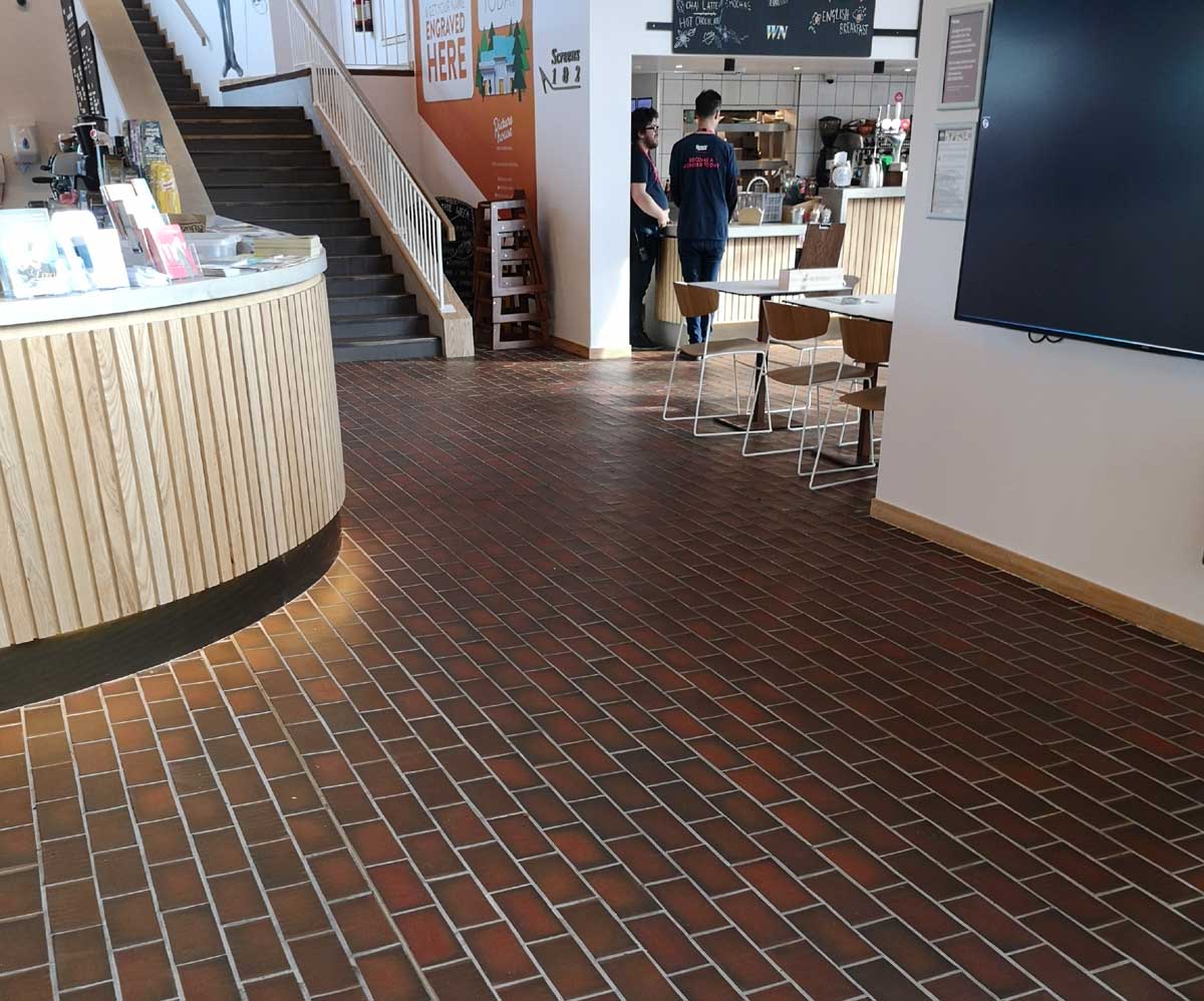 Dark multi quarry tiles were used to renovate West Norwood cinema and library