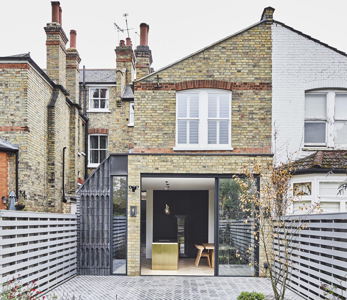 Extension by Mulroy Architects uses special Ketley Staffs blue plinth bricks to create a fluted textured effect