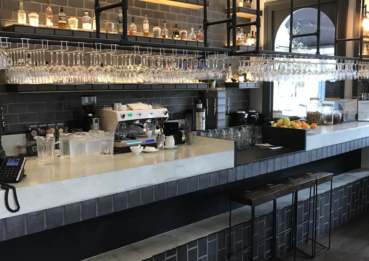 Ketley Staffs Blue Quarry Tiles line the wall and the bar adding a Victorian heritage feel to this Chelsea pub