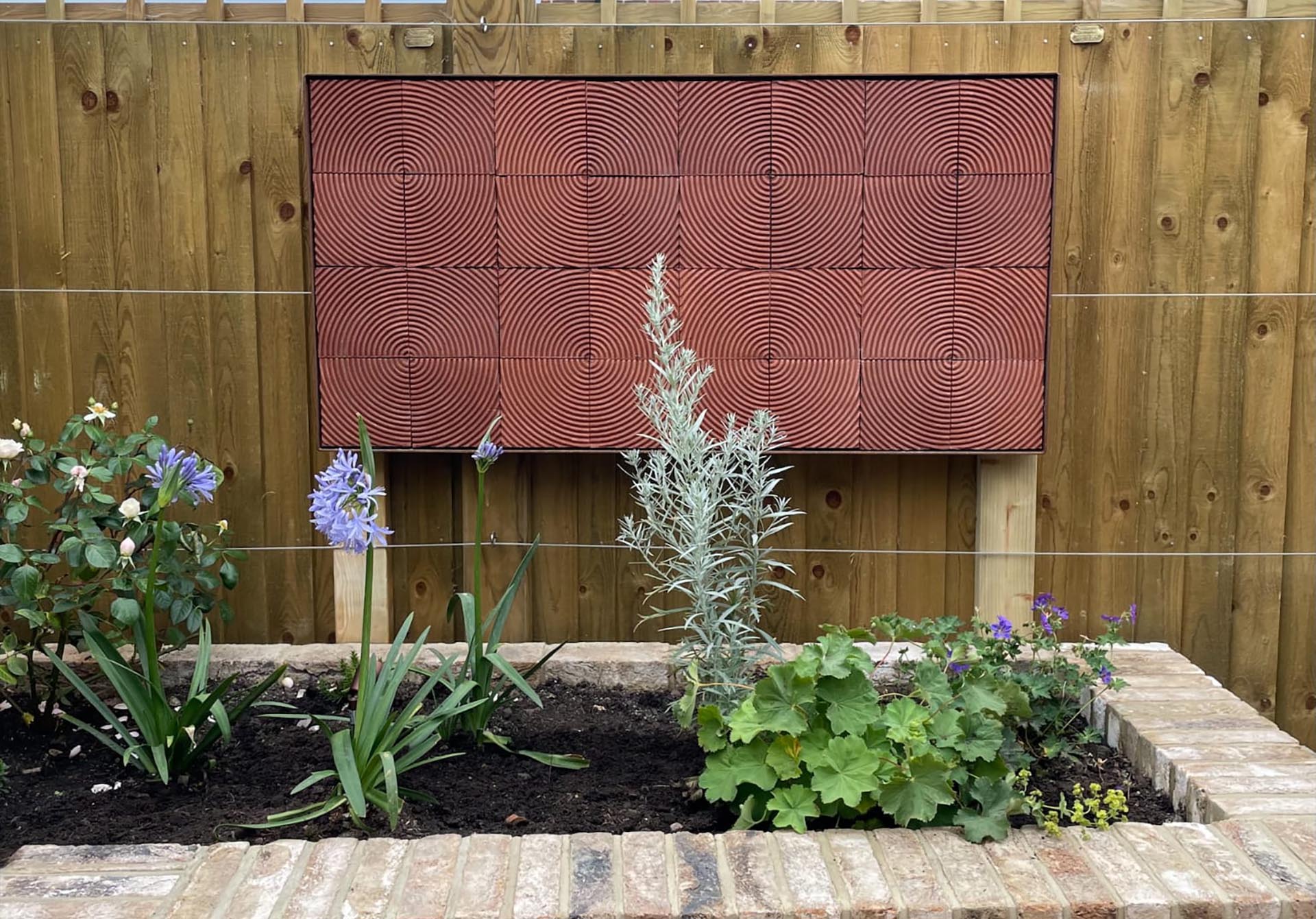 Moss bricks designed by Poppy Pippin feature without moss in this garden