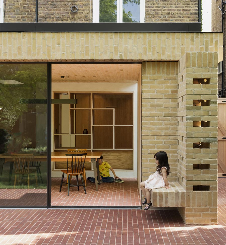 Staffordshire red quarry tiles unite the indoor and outdoor space at a residential property in North London