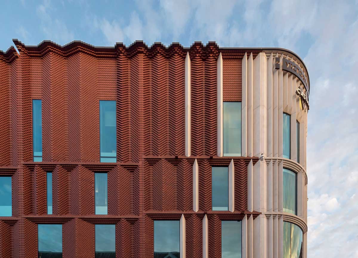 Staffordshire red textured brick facade at Victoria Gate Arcade in Leeds