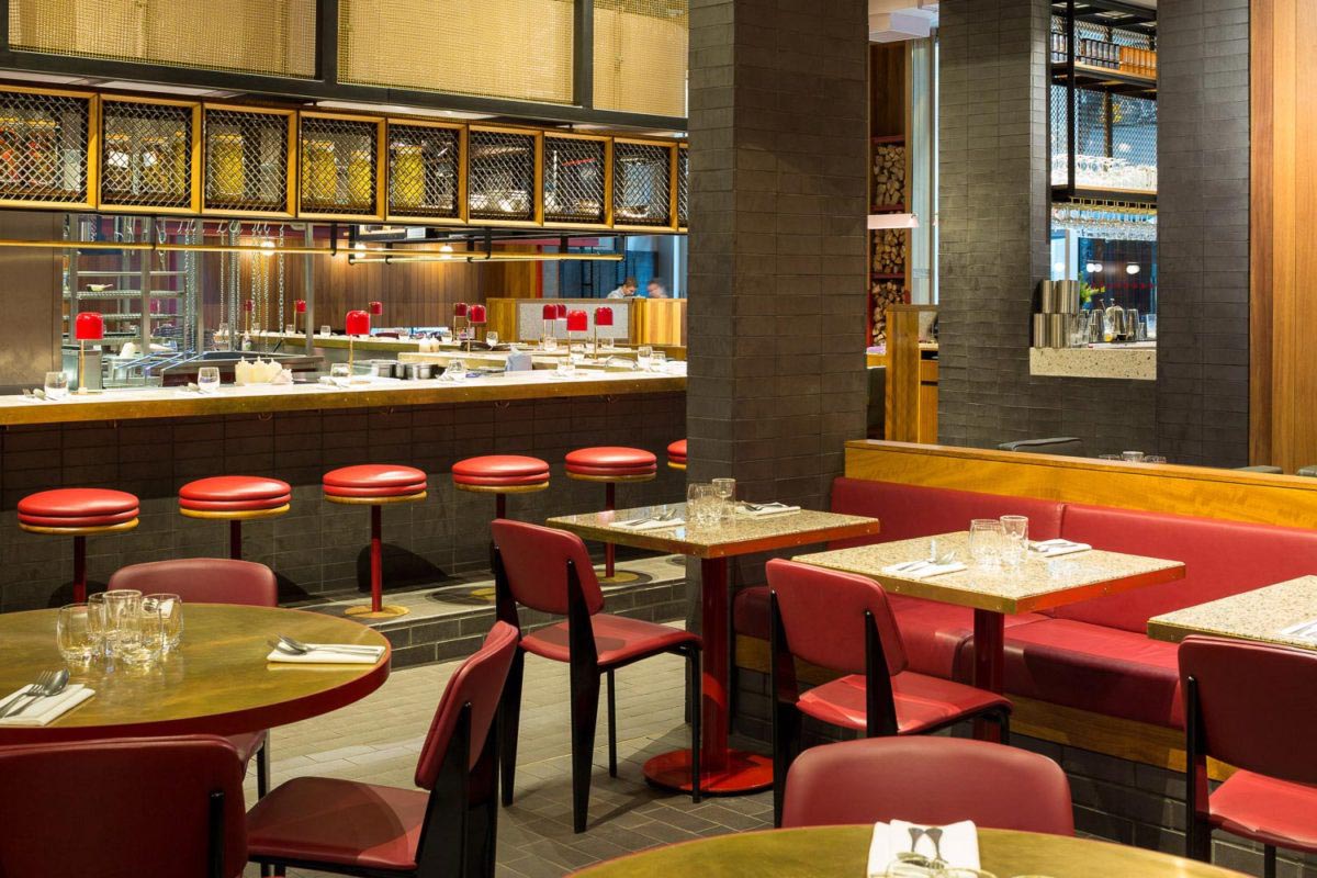 Staffs blue brick sized clay quarry tiles clad the bar area at Temper City in Angel Court
