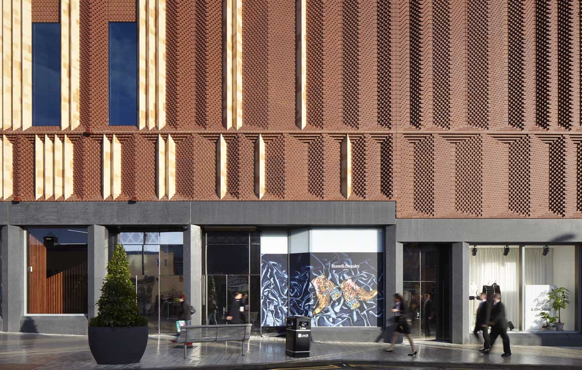 Staffs red textured brick facade at Victoria Gate Arcade Leeds