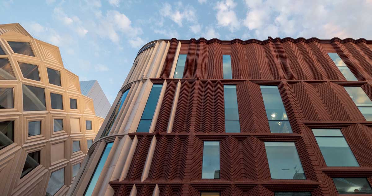 Staffs red textured brick facade at Victoria Gate Arcade in Leeds