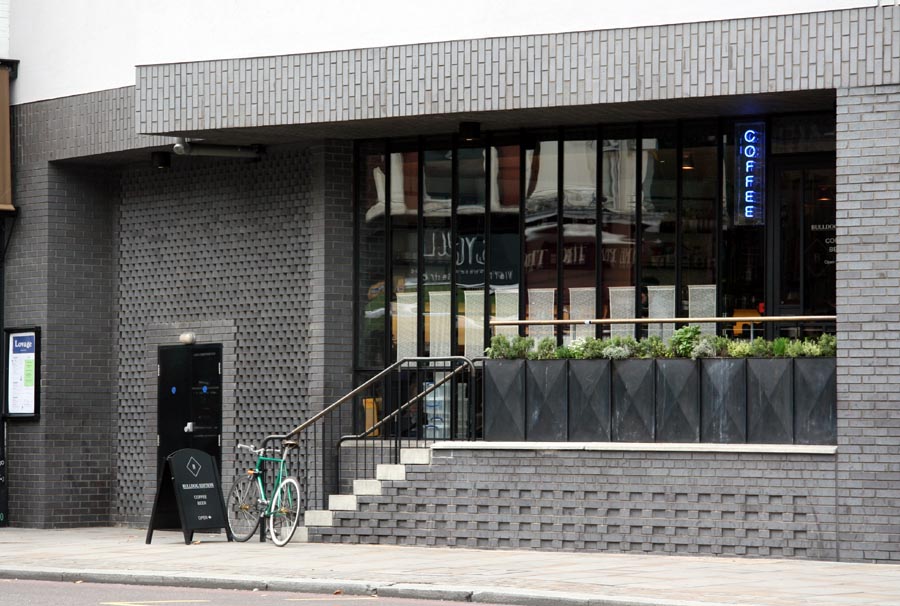 combination of Ketley Staffs Blue Facings and brick slips create aTrendy London Cafe