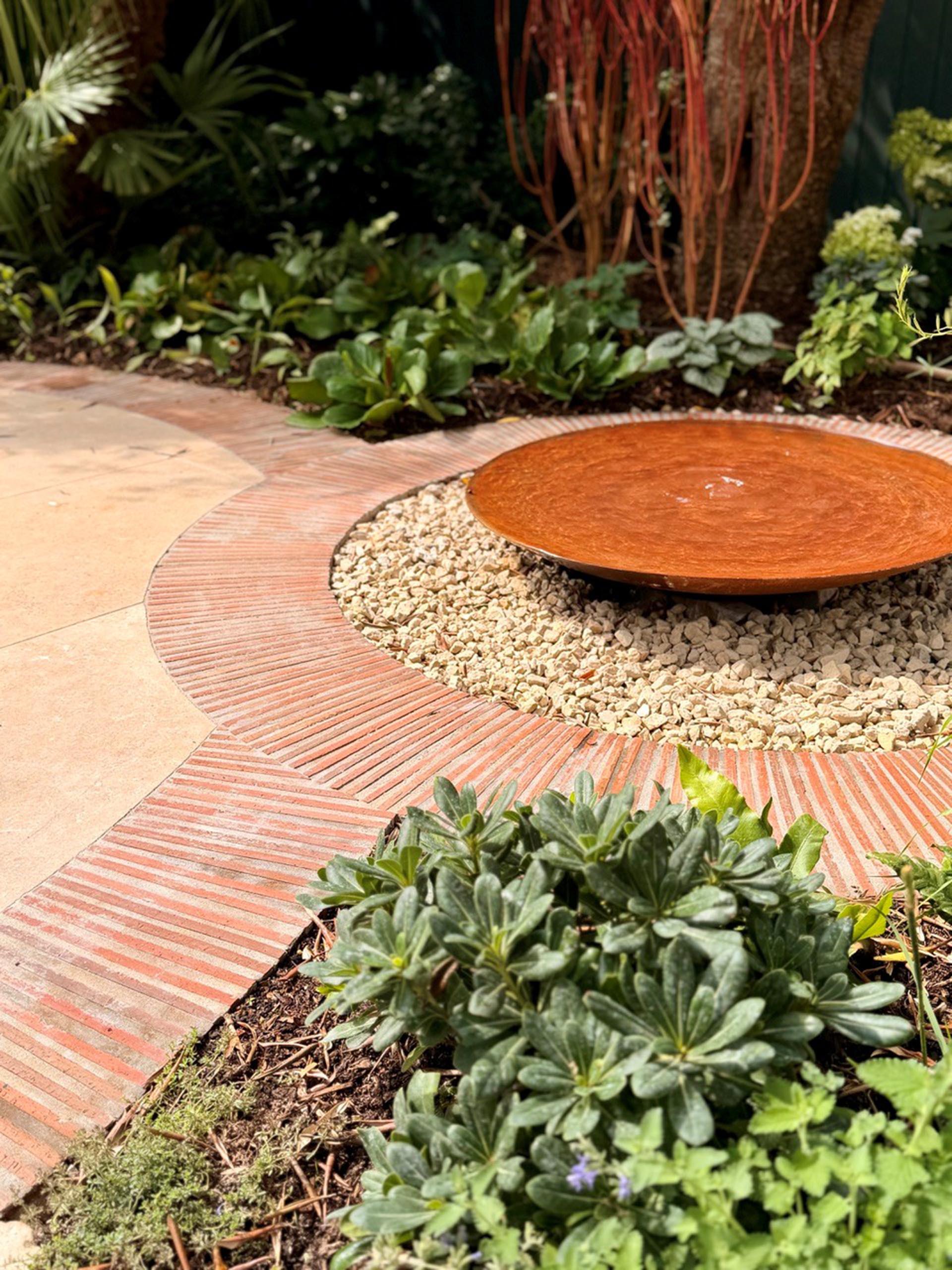 linium bricks in a garden project by designer Tom Howard