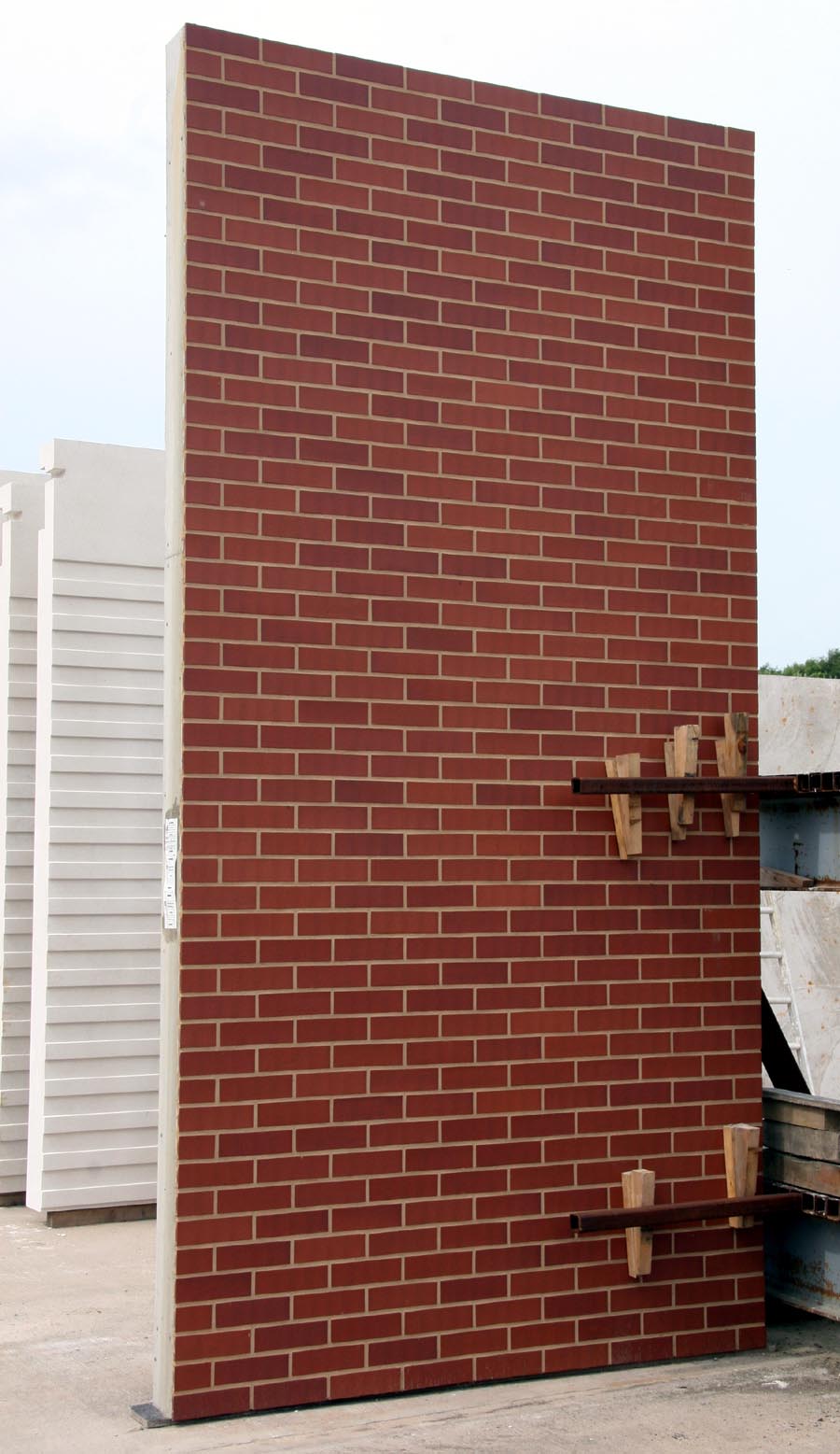 panel of smooth mixed red brick slips