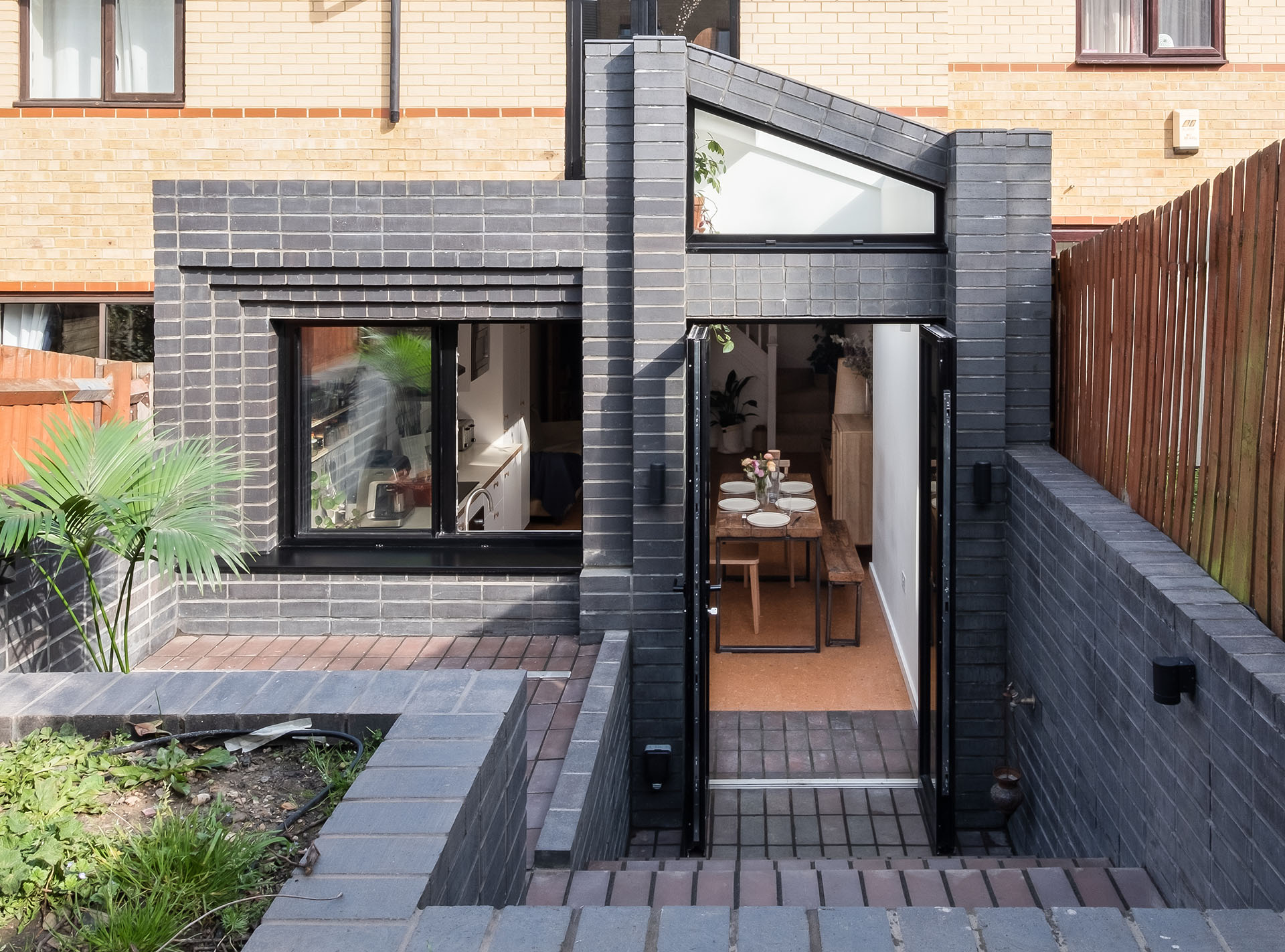 residential extension by Studio Manifest using Ketley Staffs blue bricks brown brindle quarry tiles image by David Valinsky