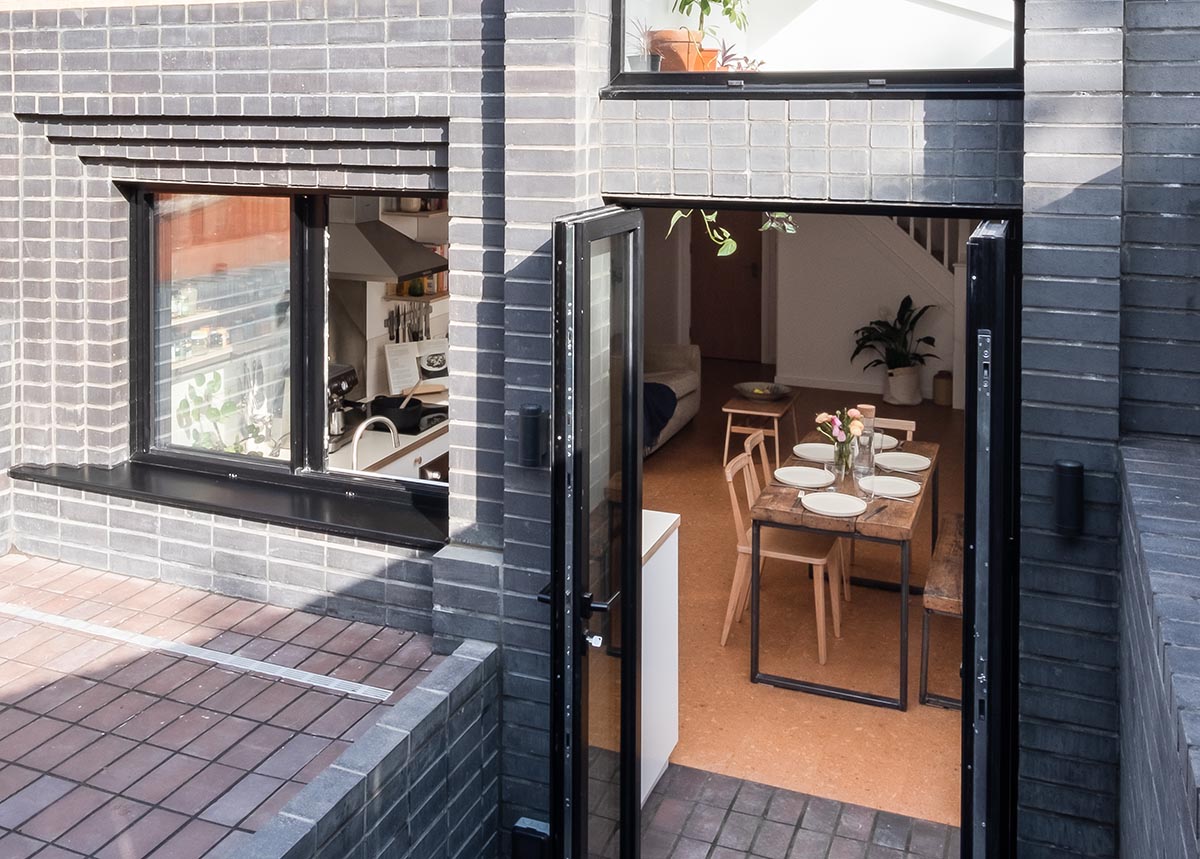 residential extension by Studio Manifest using Ketley Staffs blue bricks and brown brindle quarry tiles image by David Valinsky