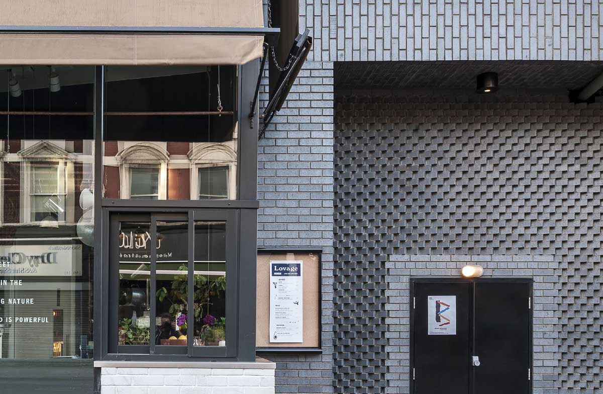 staffs blue textured brickwork at the Ace Hotel in London